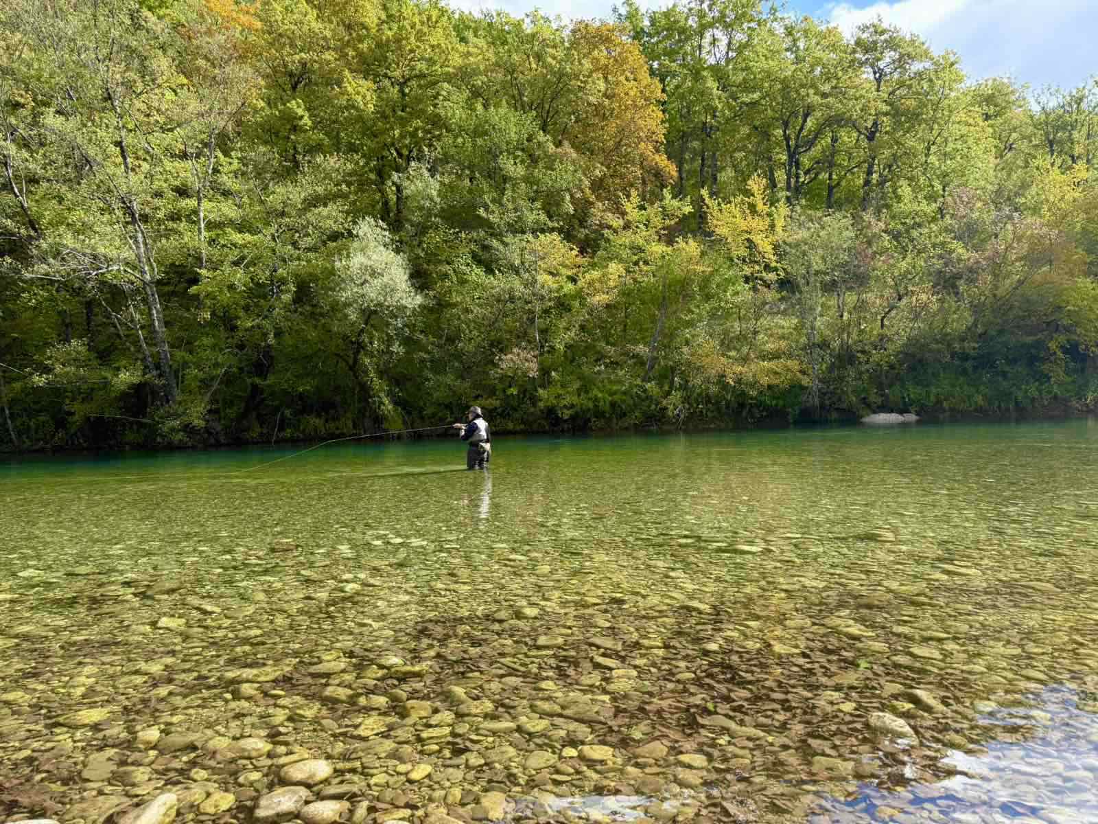 Angler casting a line